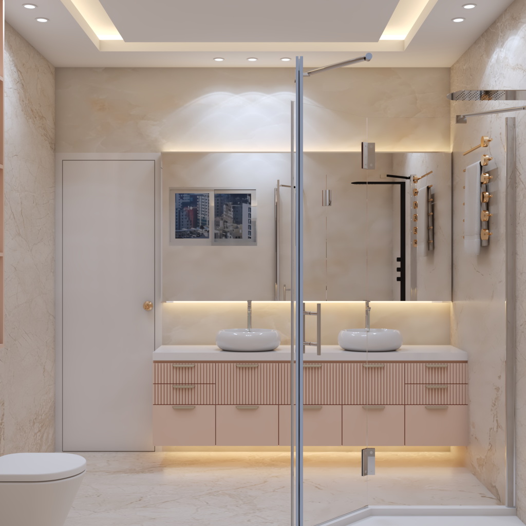 A luxurious master bathroom featuring marble-clad walls and floors, a double vanity with peach-toned fluted cabinets, and two white vessel sinks. The space includes a large backlit mirror, a glass-enclosed shower with gold-finished fixtures, and a recessed shelving unit built into the wall.